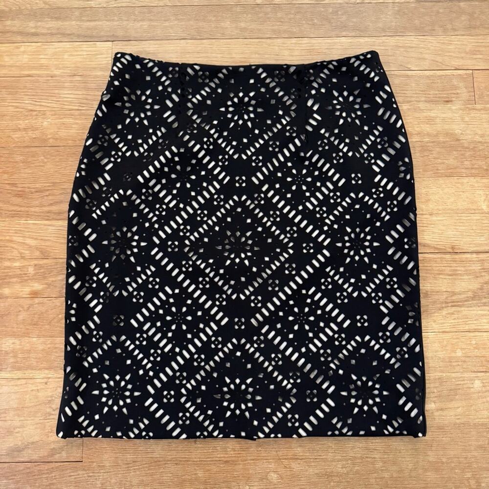 Chico's black laser cut knee length pencil skirt size 10 (Chico's size 1.5)
b43